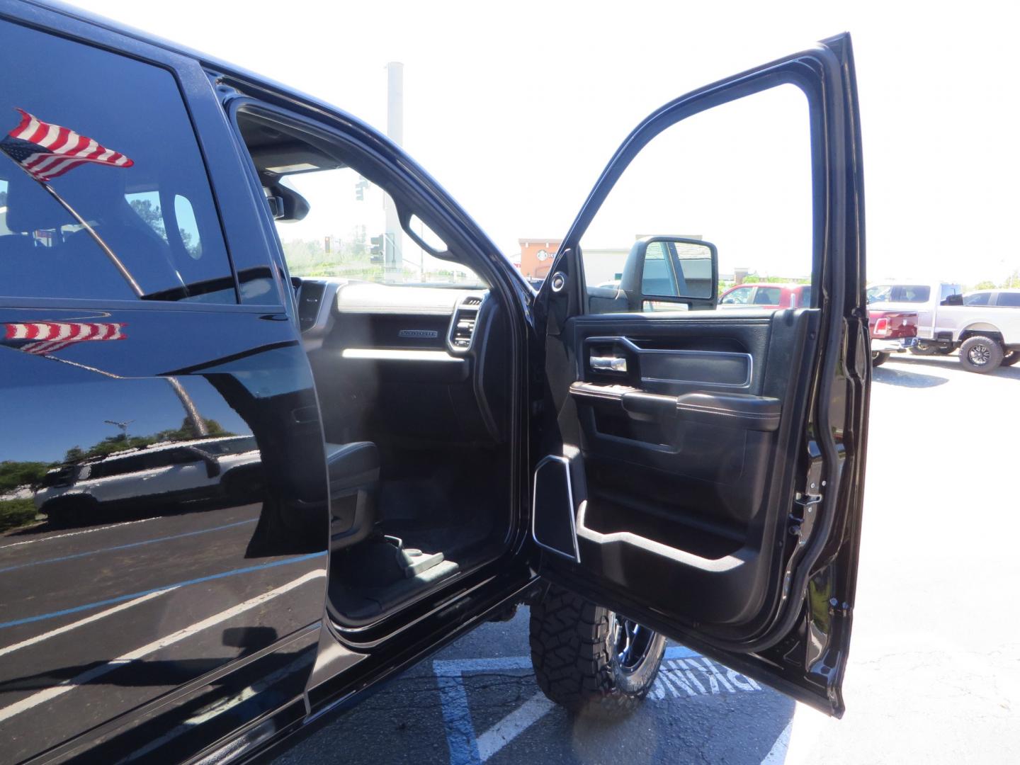 2023 BLACK /BLACK RAM 2500 Laramie Crew Cab SWB 4WD (3C6UR5FL0PG) with an 6.7L L6 OHV 24V TURBO DIESEL engine, 6A transmission, located at 2630 Grass Valley Highway, Auburn, CA, 95603, (530) 508-5100, 38.937893, -121.095482 - Features a new BDS 4" Long Arm suspension system, Fox shocks, 37" Toyo RT Trail tires, and 20" XD Buck wheels. Also has Factory 5th wheel prep. - Photo#42